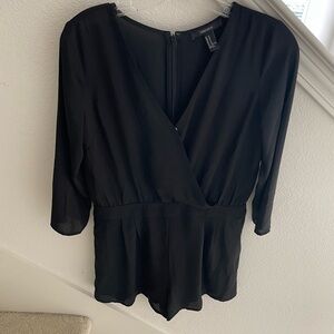 Forever 21 Black Long sleeves Romper size M.